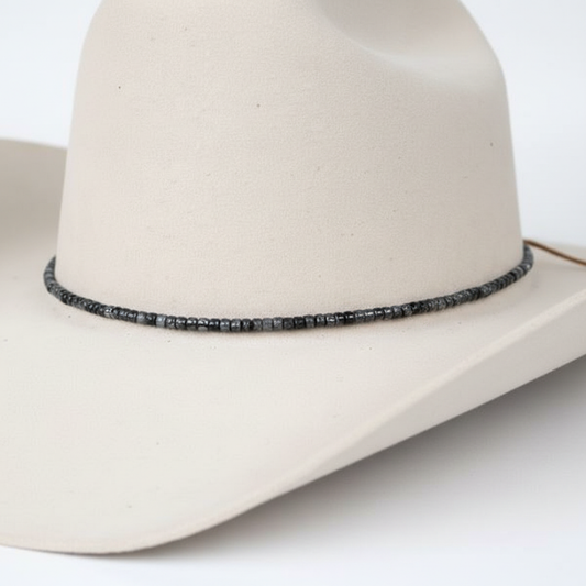 Close-up white hat product photo with black jasper band